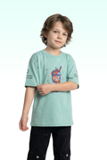 Child wearing a light blue t-shirt with a colorful design on a light white background